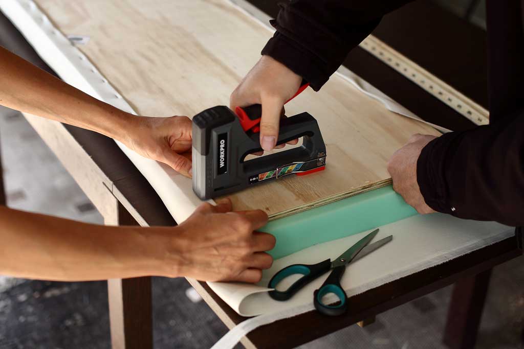 staple fabric to plywood