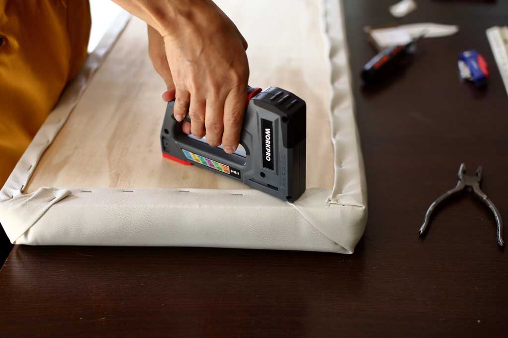 staple fabric to plywood