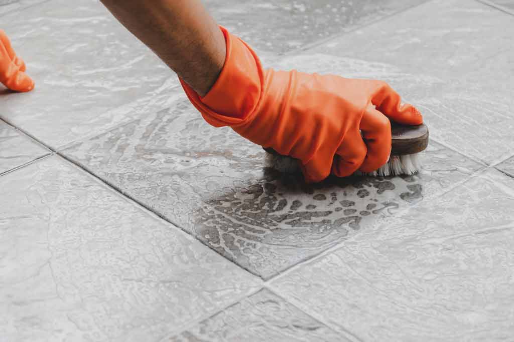 washing white cement off floor tiles